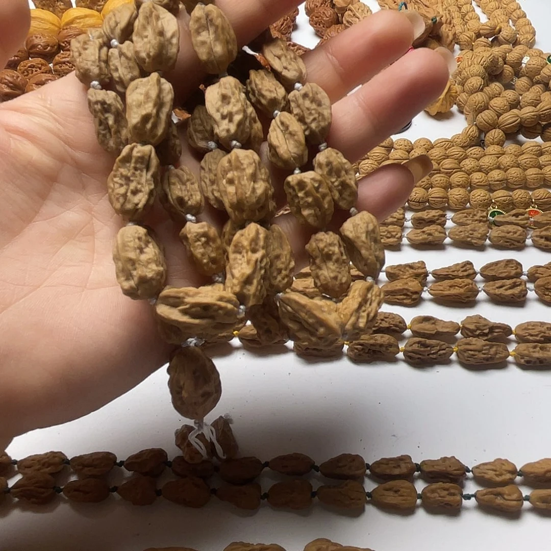 董***芳文玩核桃吊坠异形