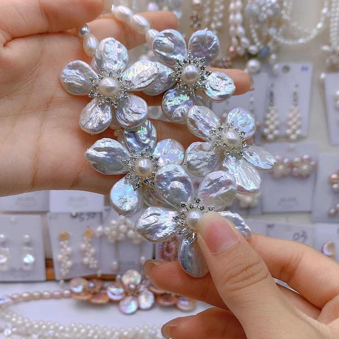 银S925镶嵌淡水珍珠耳饰一**遂