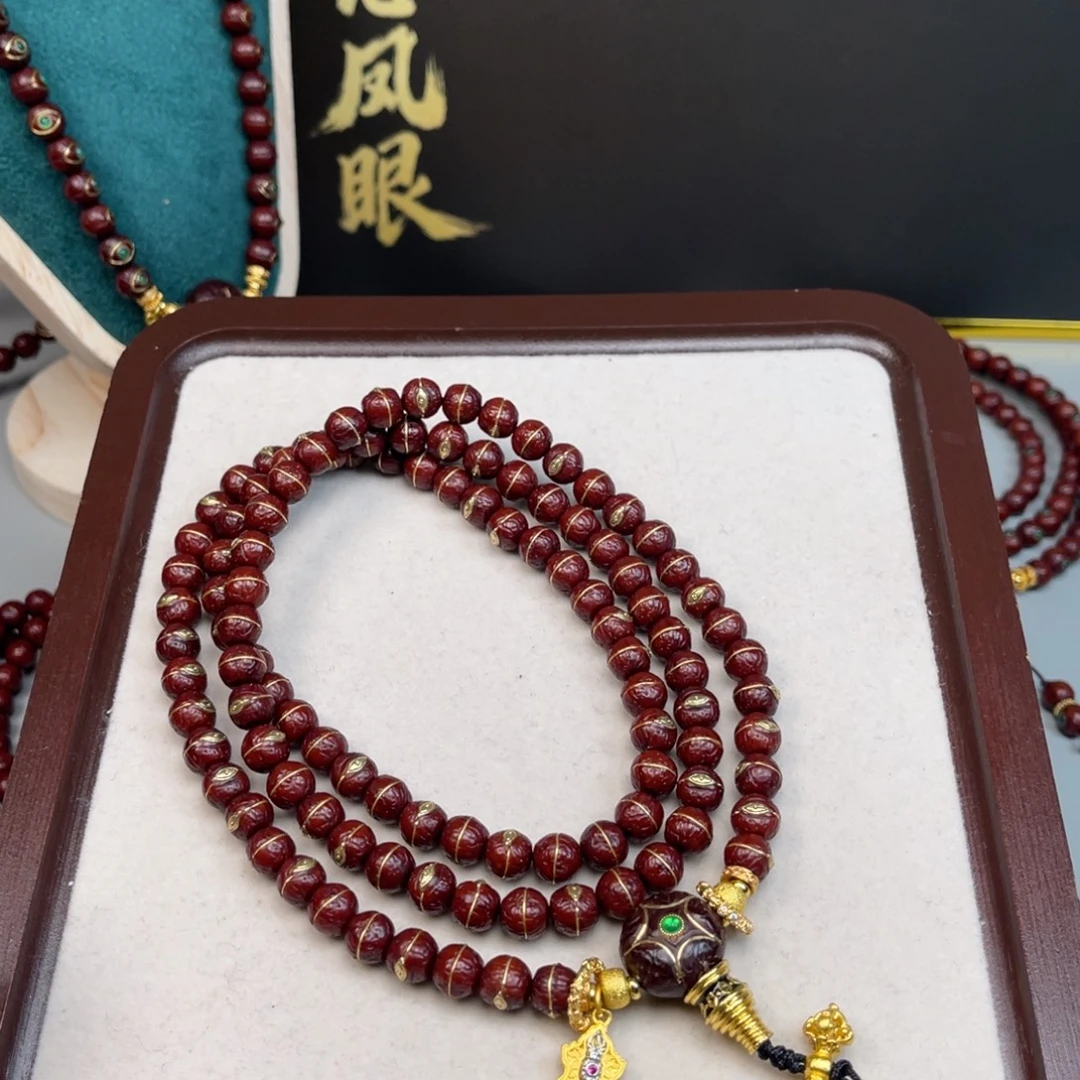 T***y凤眼菩提吊坠凤眼