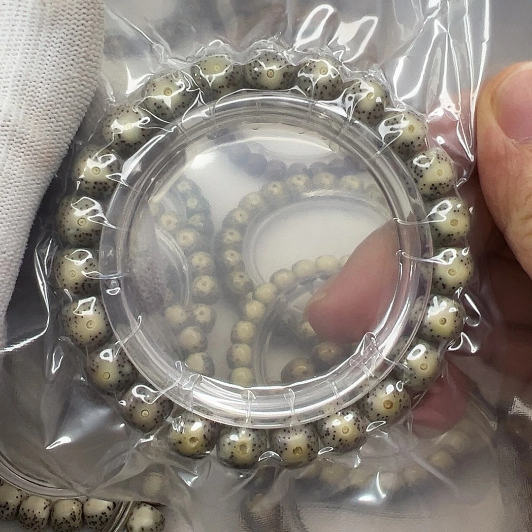 手串星月菩提10×9灰糯冰  909