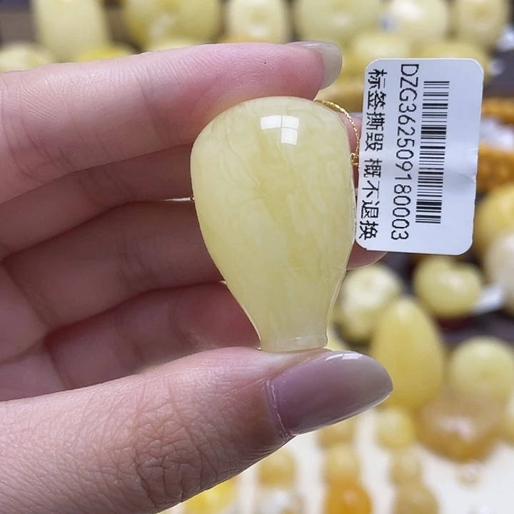 琥珀未镶嵌裸石20.3*32.3mm妖花三通