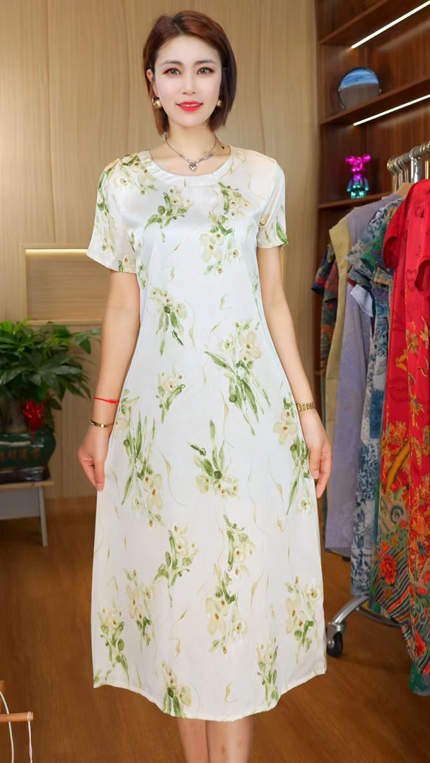 A-25439时尚宽松遮肉连衣裙圆领兰花