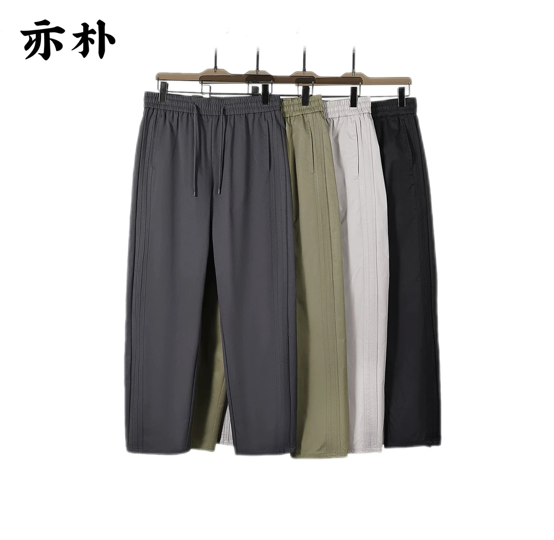 【亦PU】休闲裤情侣春季新款户外拼接运动时尚通勤百搭宽松直筒裤