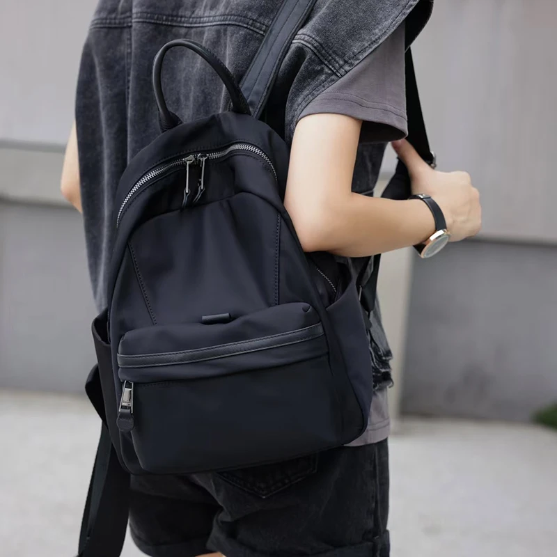 2025春夏新款百搭双肩包时尚休闲轻便户外通勤防水大容量旅行包