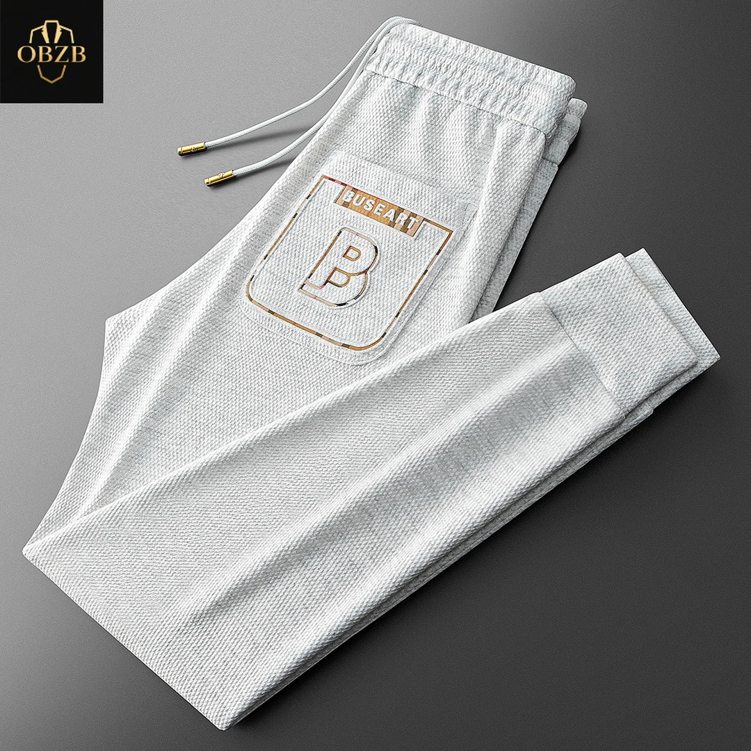 夏季时尚潮流华夫格卫裤薄款透气休闲裤男士修身小脚运动裤子男款