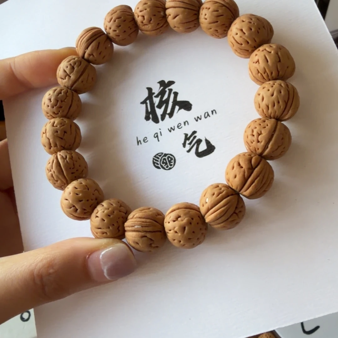 小***雅野生小茶壶桃核吊坠