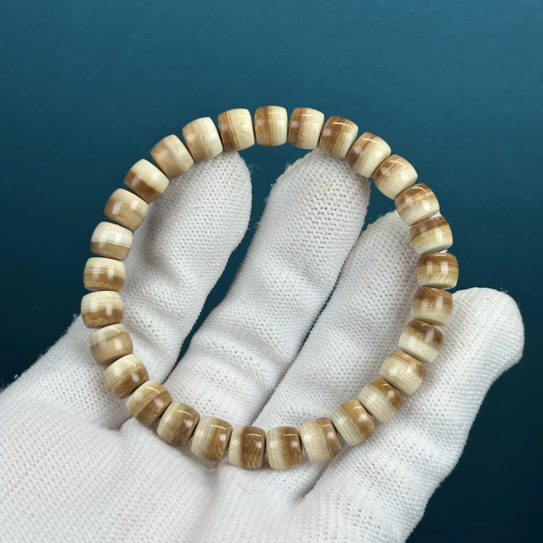 Q2063天然猛犸牙汉堡直切手串7*6mm支持鉴定 假一罚四