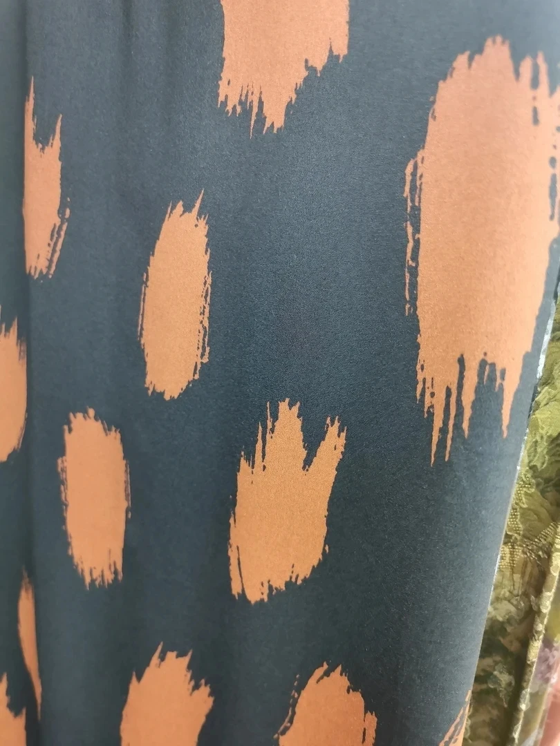 橘色自由风 桑波纱布料