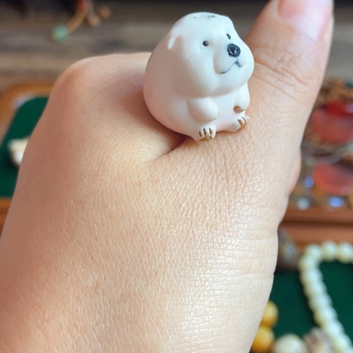 多****¥配饰鹿角雕刻小狗一个