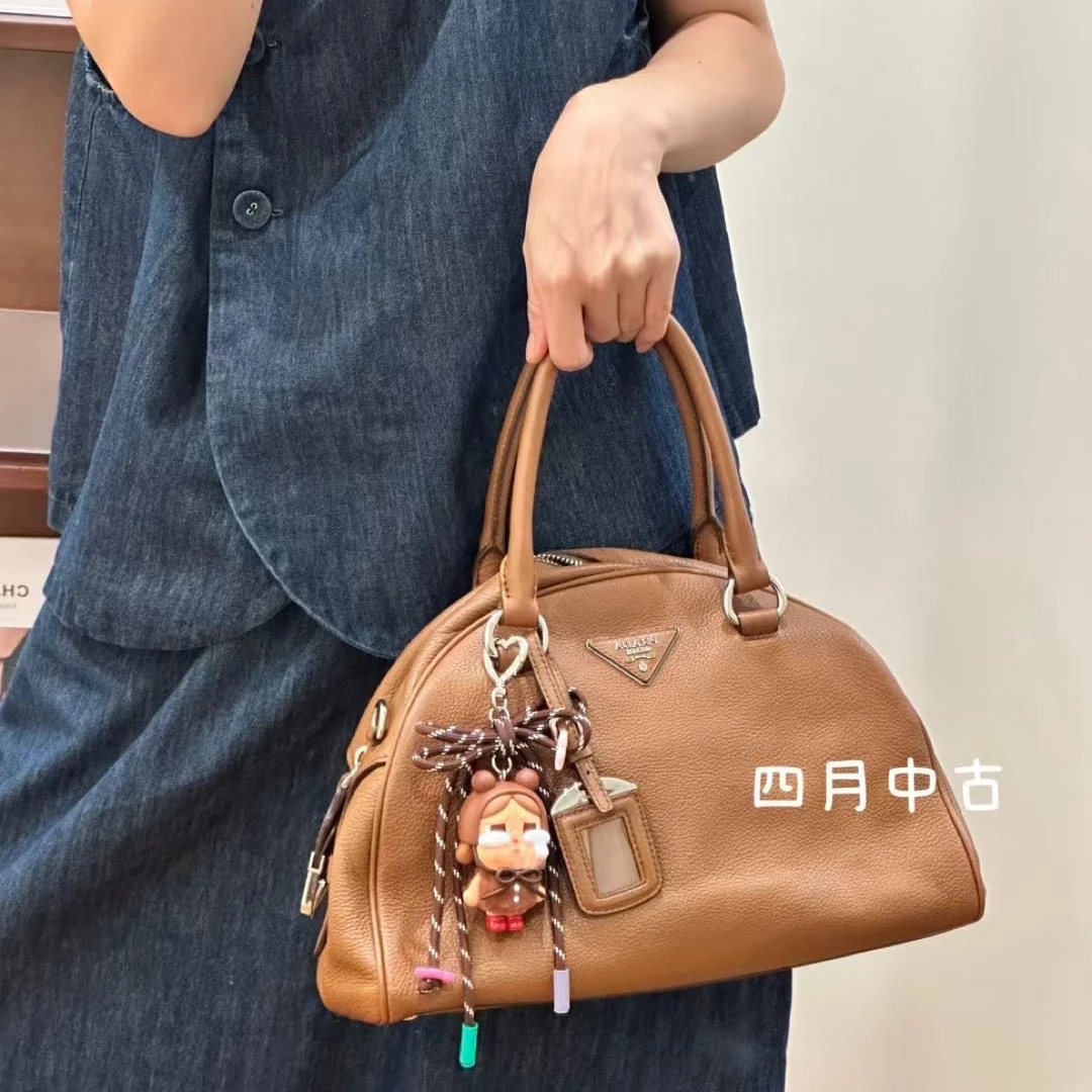 95新 Prada/普拉达 焦糖棕牛保龄球包包 15年 51451