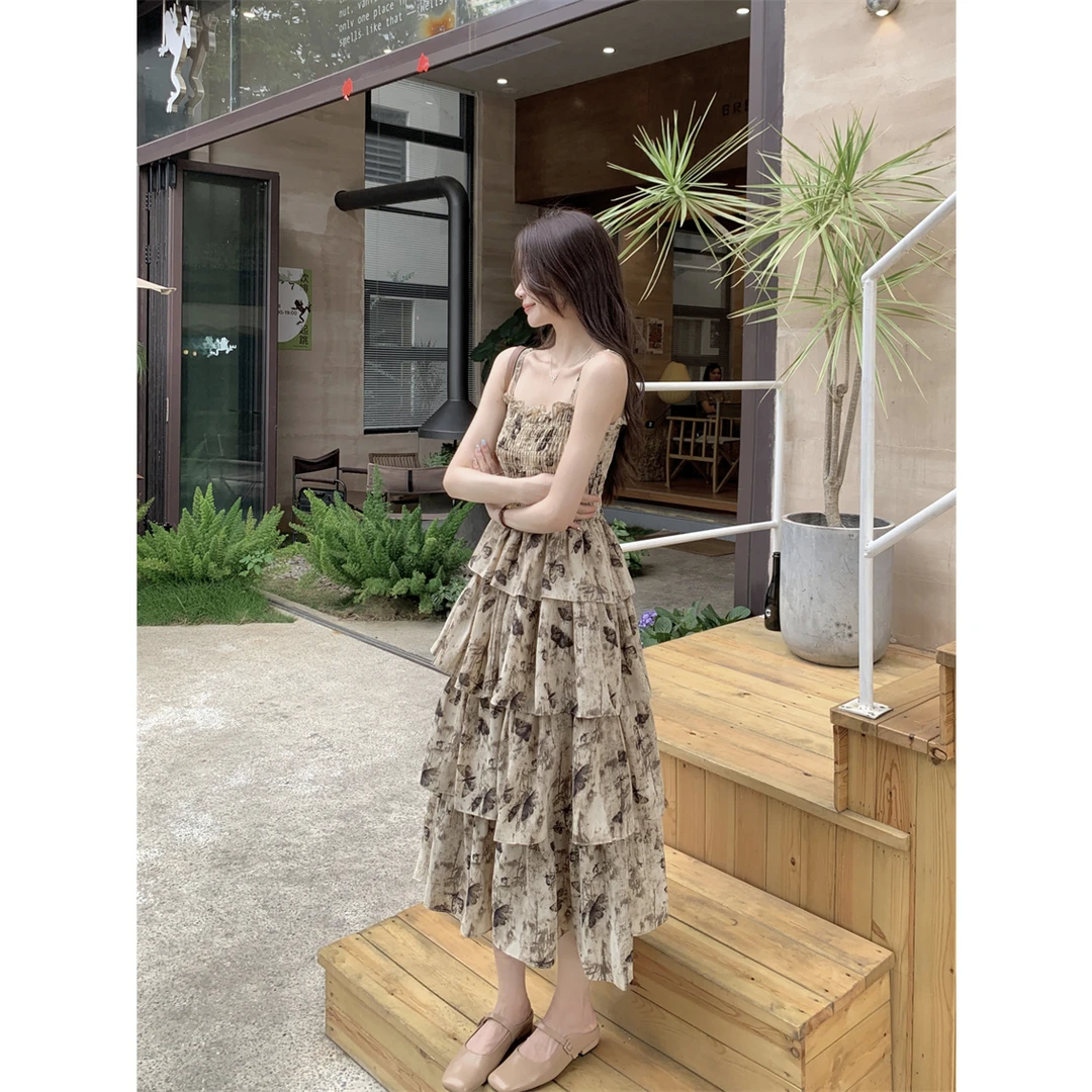 《现货现发》小碎花蝴蝶吊带收腰2025新款显瘦气质蛋糕长款连衣裙