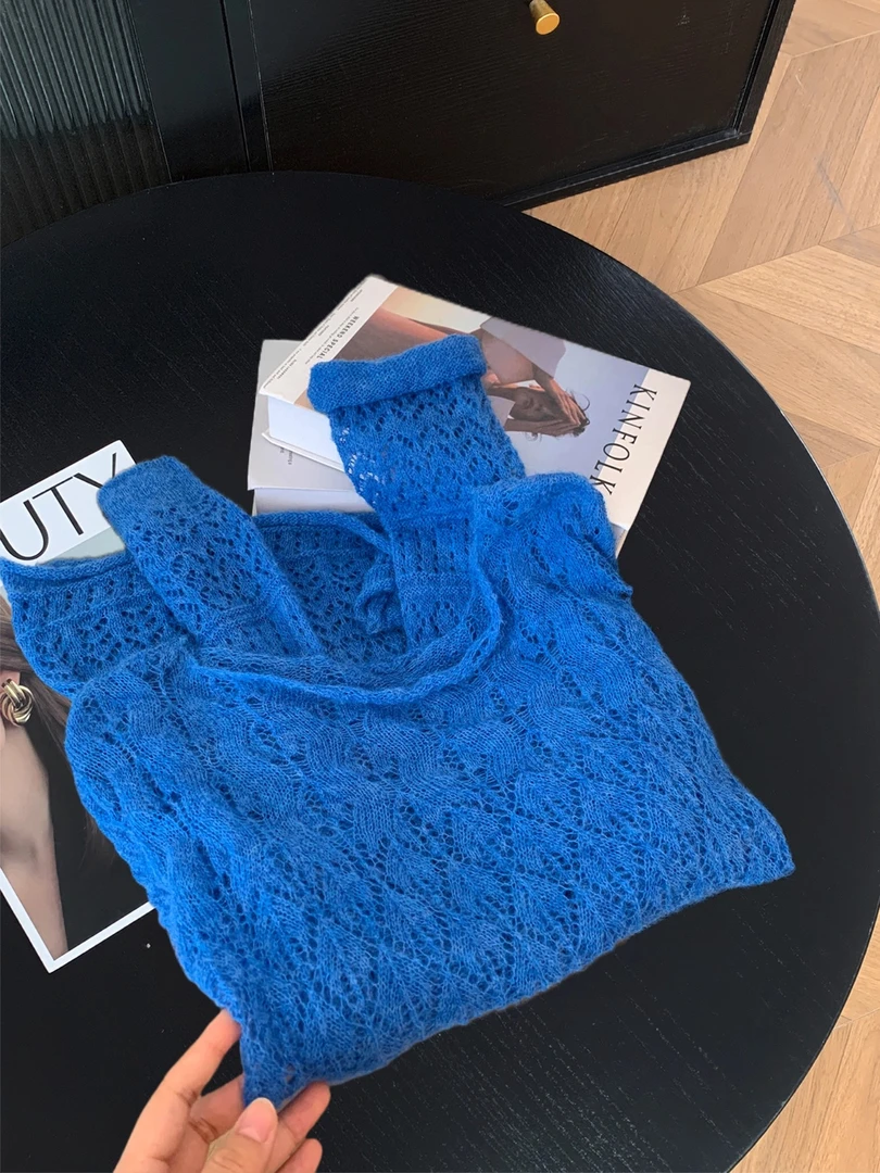 韩系高级感克莱因蓝镂空长袖毛衣女秋季新款显白气质套头针织上衣