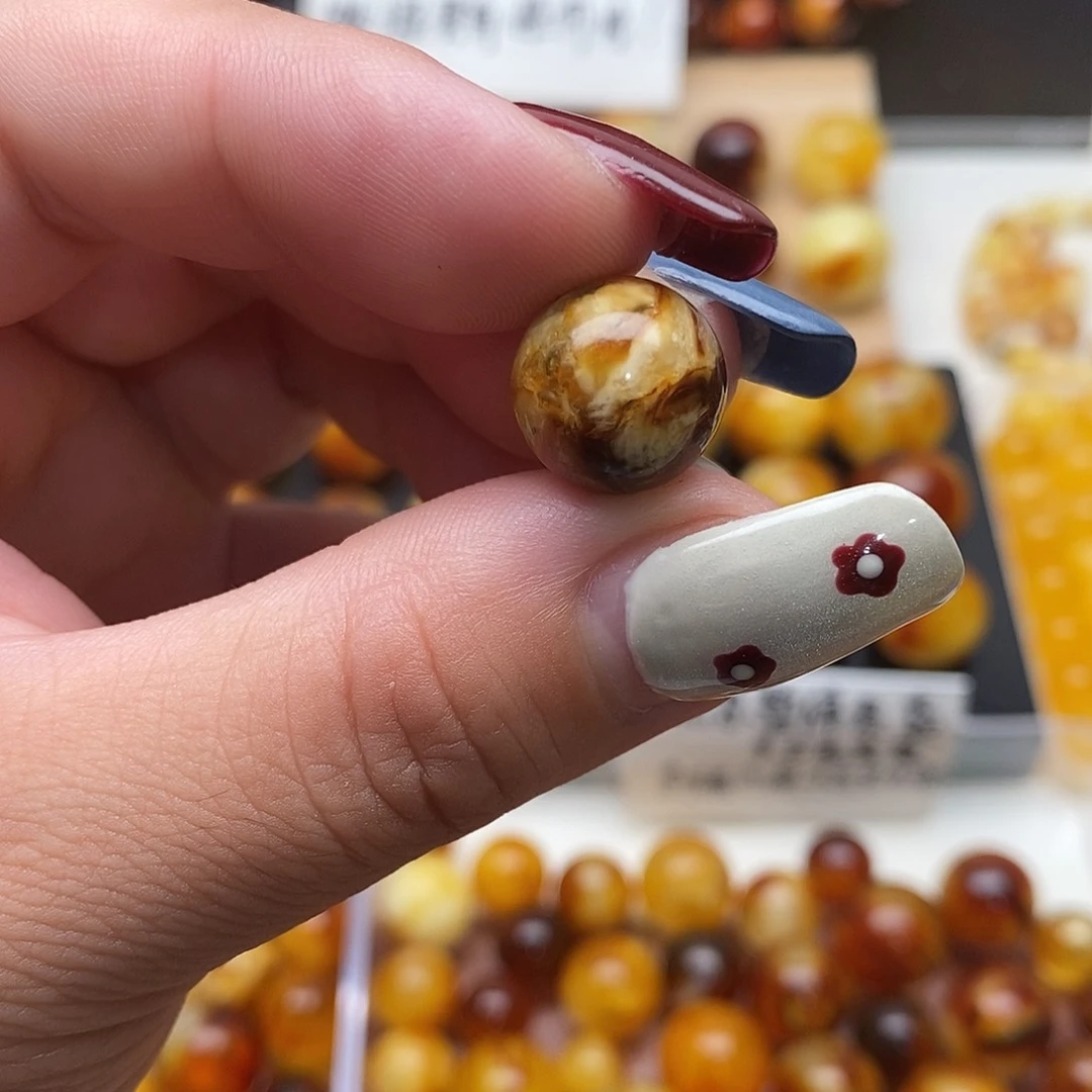 曲***干裸石琥珀未镶嵌蜜蜡