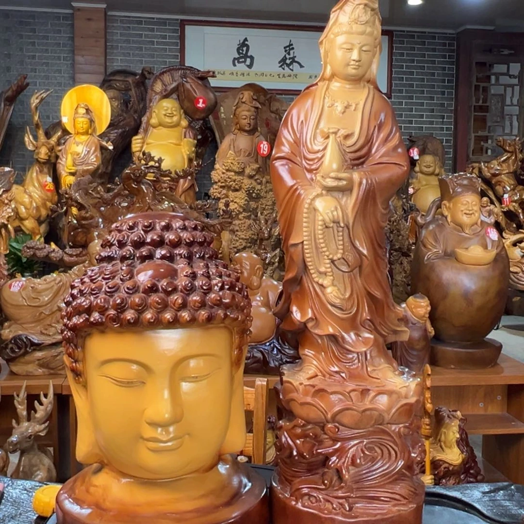 悠***山木木根雕观音佛头摆件香樟木