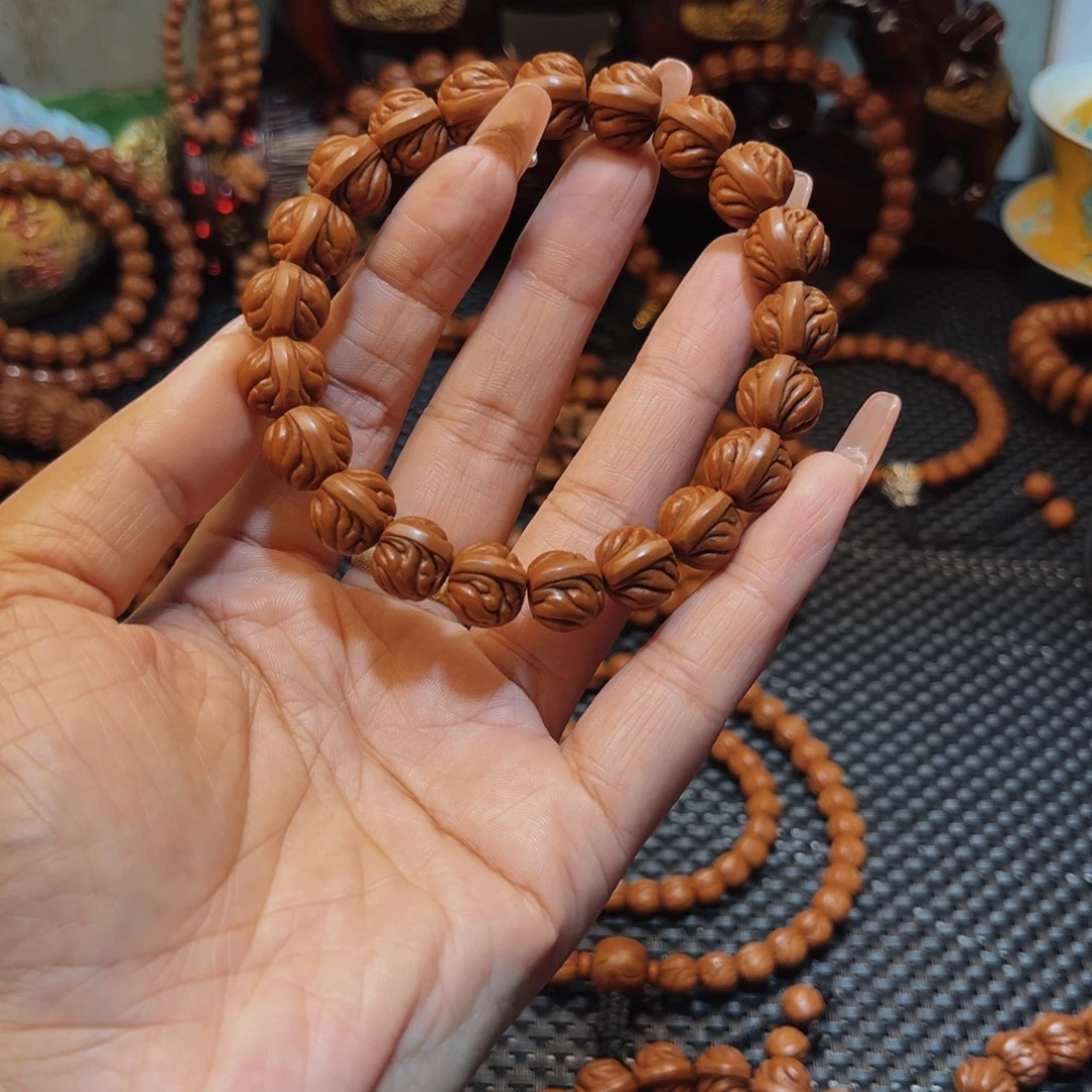 自***t手串桃核12顶级双脊龙单圈