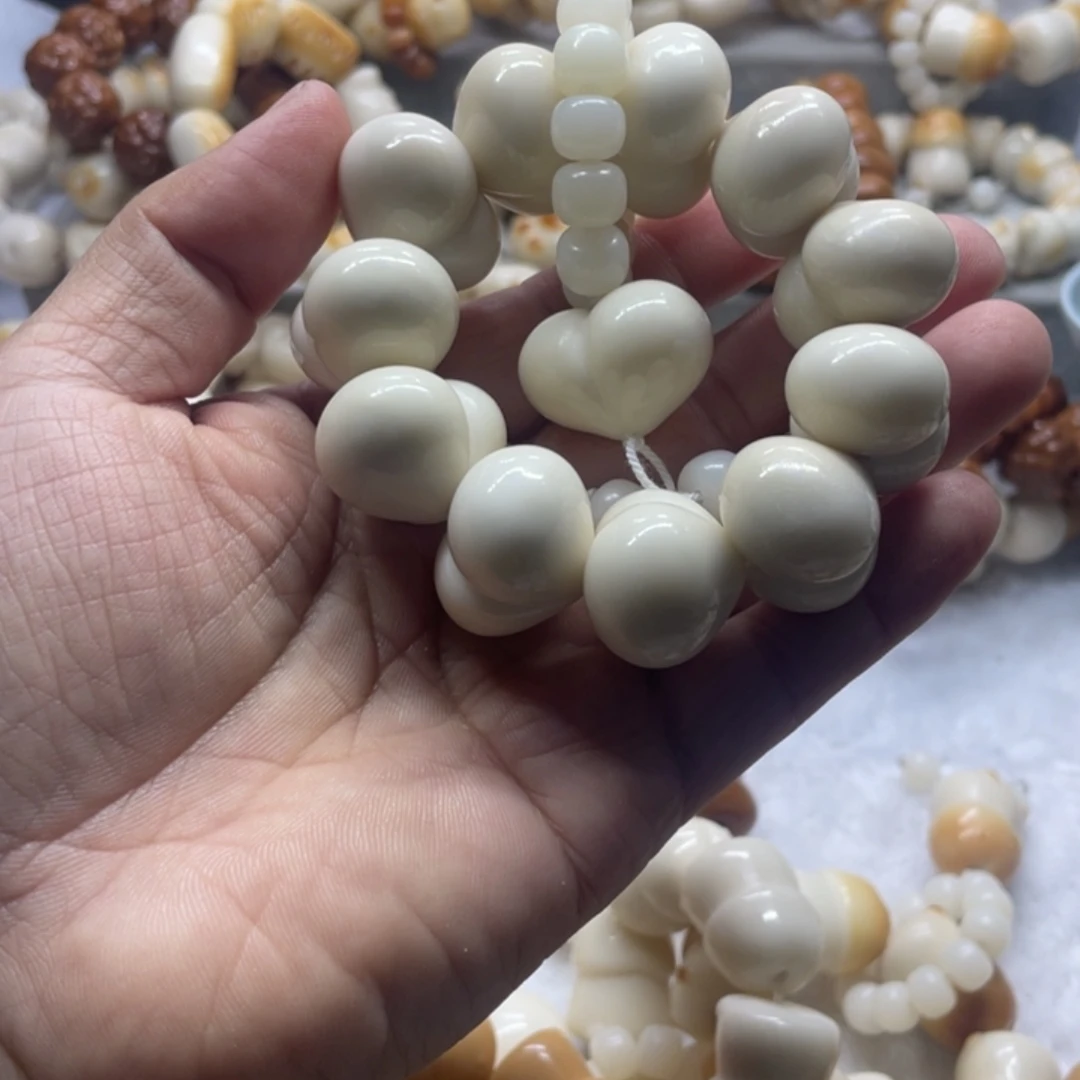 吊坠菩提根/象牙果全品象牙果光面屁桃手串卡26