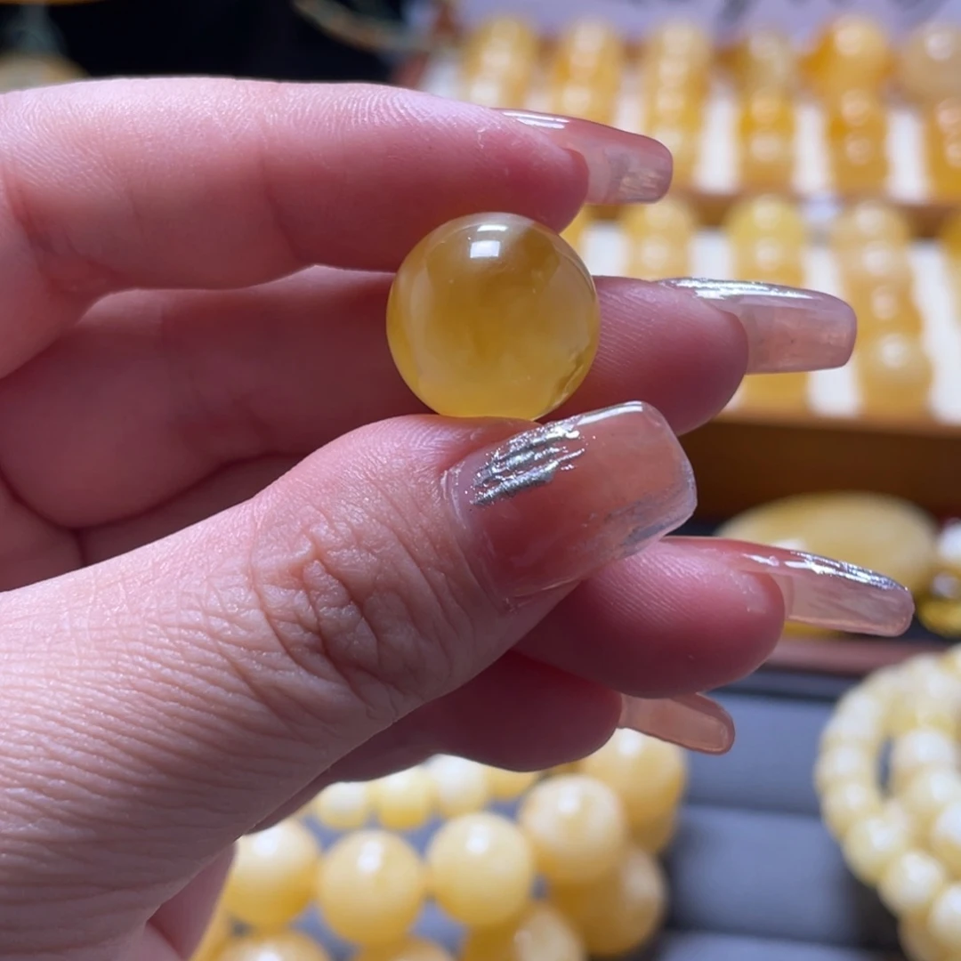 关***郑未镶嵌琥珀珠宝奇石