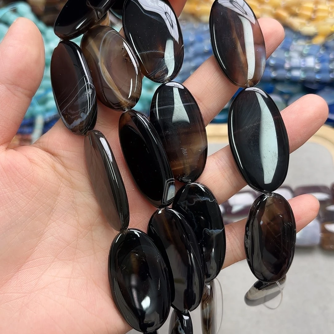 玛瑙/玉髓未镶嵌珠宝半成品22×40深咖玛长蛋型一条