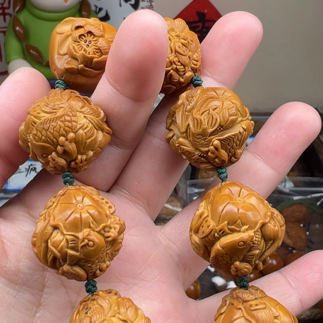 橄榄核手串/手链荷花鱼