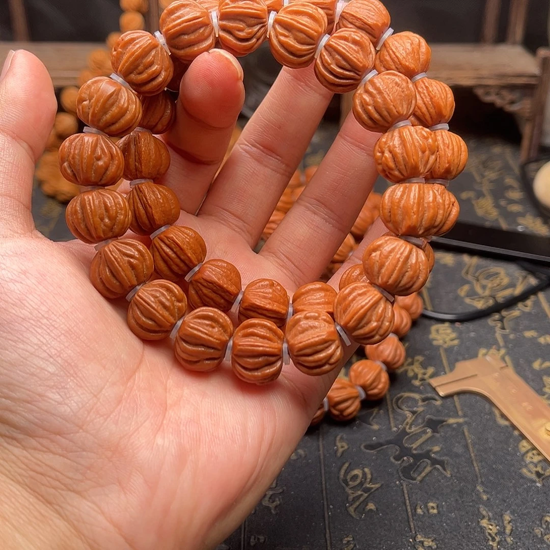 吊坠桃核佛手手串