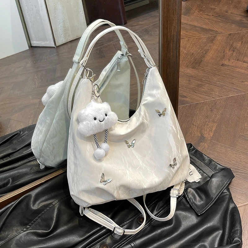 新疆西藏包邮大容量包包女2025跨境新款小众设计通勤多功能双肩单