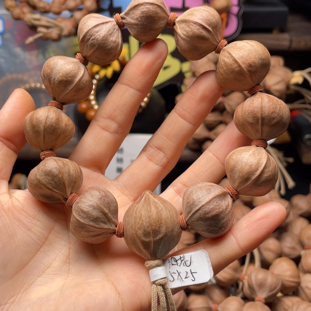 奋***行吊坠橄榄核2525四花铁核