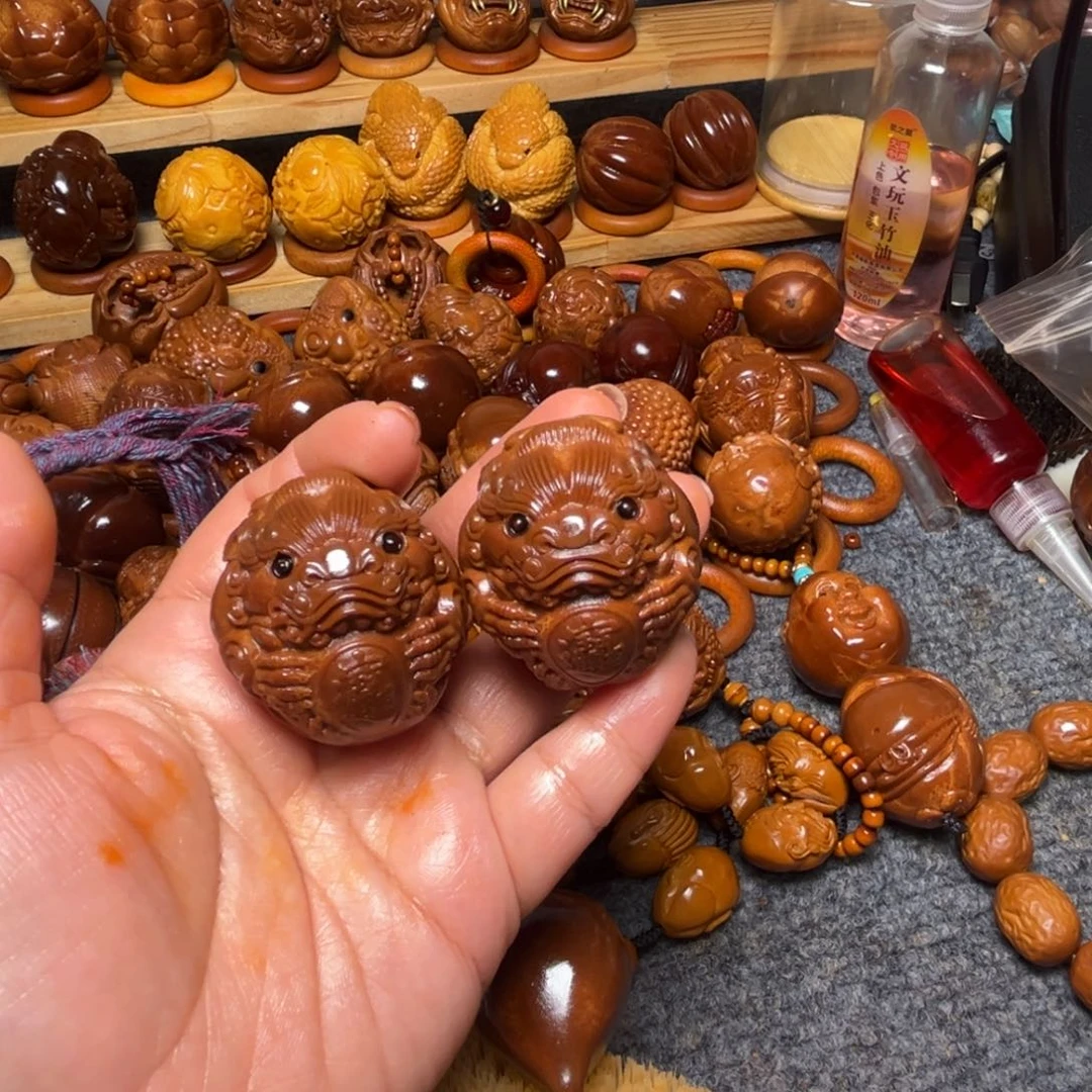 熬***龍橄榄核把件貔貅一对