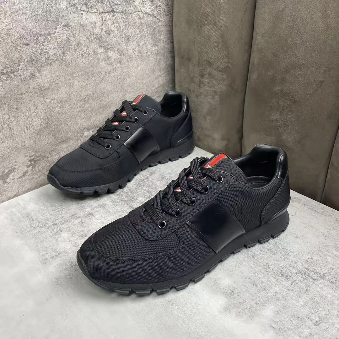 99新 Prada/普拉达 黑色帆布网面时尚轻便舒适透气运动鞋 40码