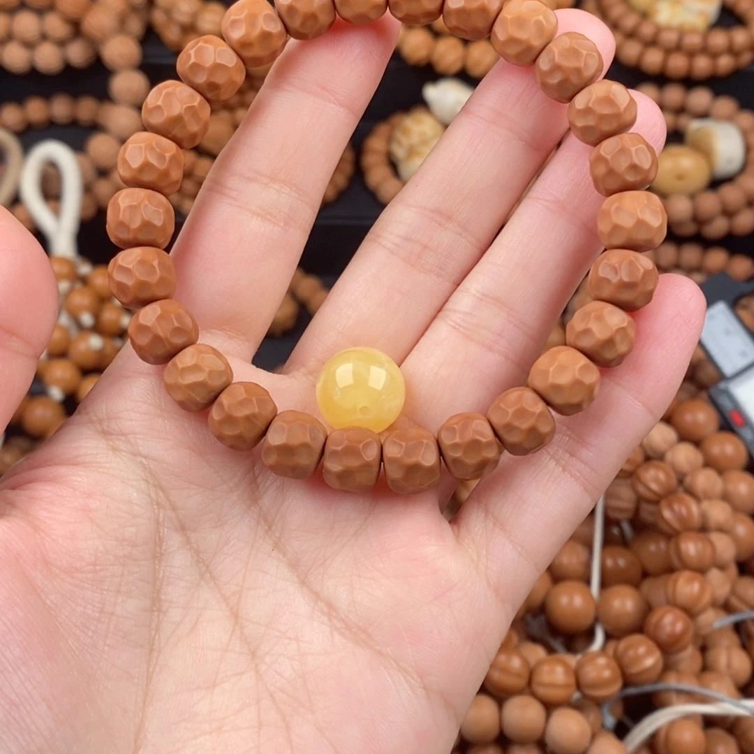 阳***-手串猴头核桃二等无相奶酪