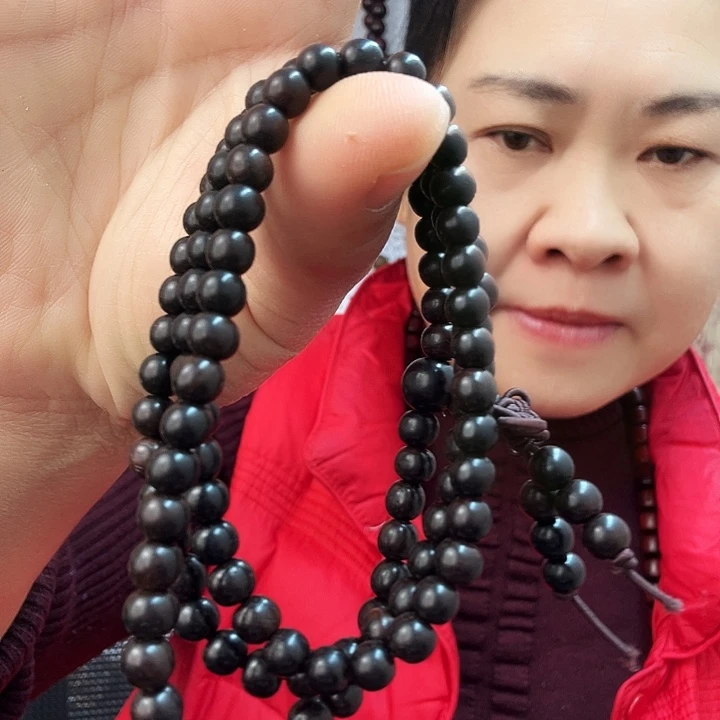 明***天紫光檀0.6的108粒的手串