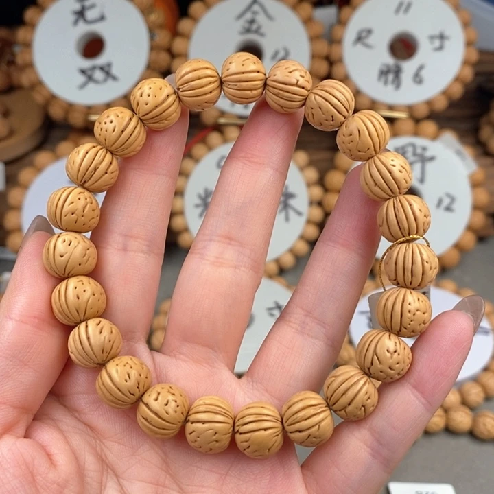 桃核手串黄桃11.5三道筋抛光板误差0.5