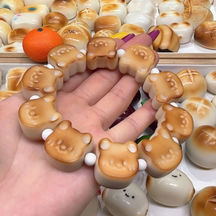 白玉菩提把件2.24.48象牙果炭烤小熊饼干
