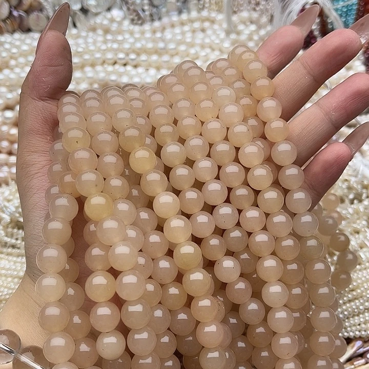 玛瑙/玉髓未镶嵌珠宝半成品2条10mm左右藕粉和田几颗有瑕