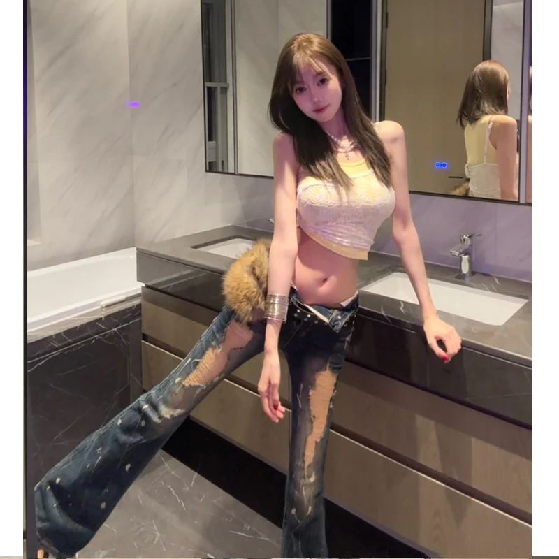 纯欲辣妹破洞中腰微喇叭涂鸦牛仔裤女2025秋季新款修身气质设计感