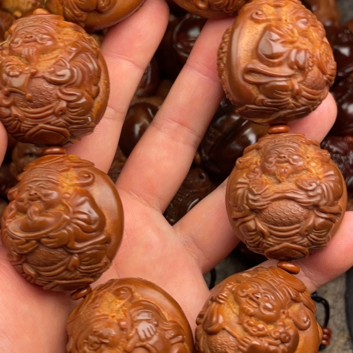 忠***橄榄核吊坠橄榄核