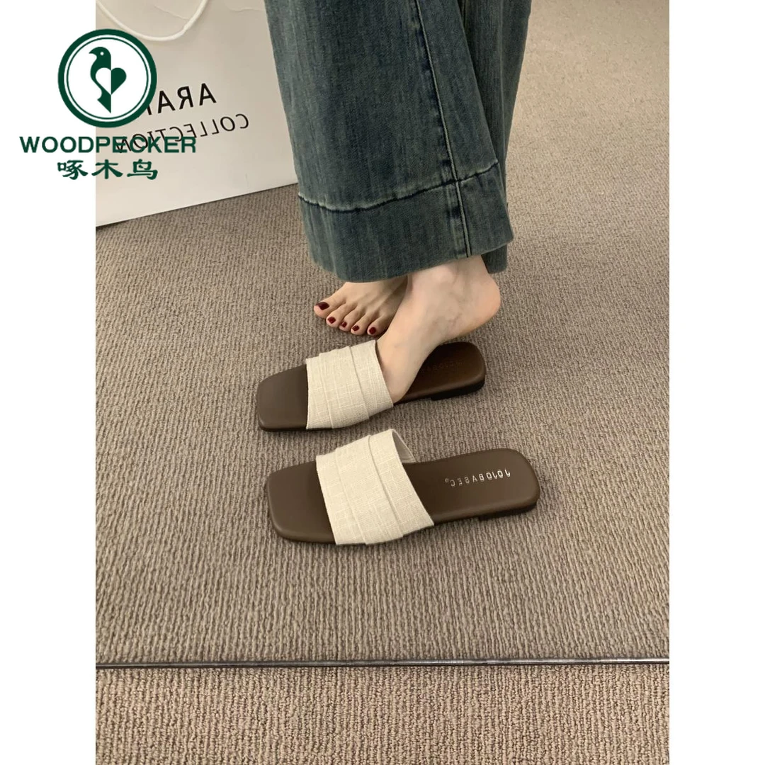 啄木鸟亚麻一字带露趾方头平底拖鞋女夏外穿度假风休闲沙滩凉拖鞋