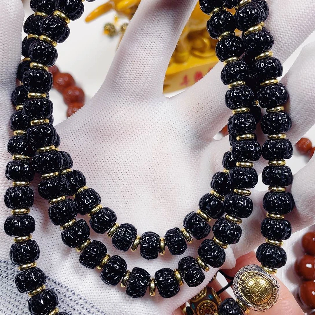 归***零吊坠猴头核桃金刚