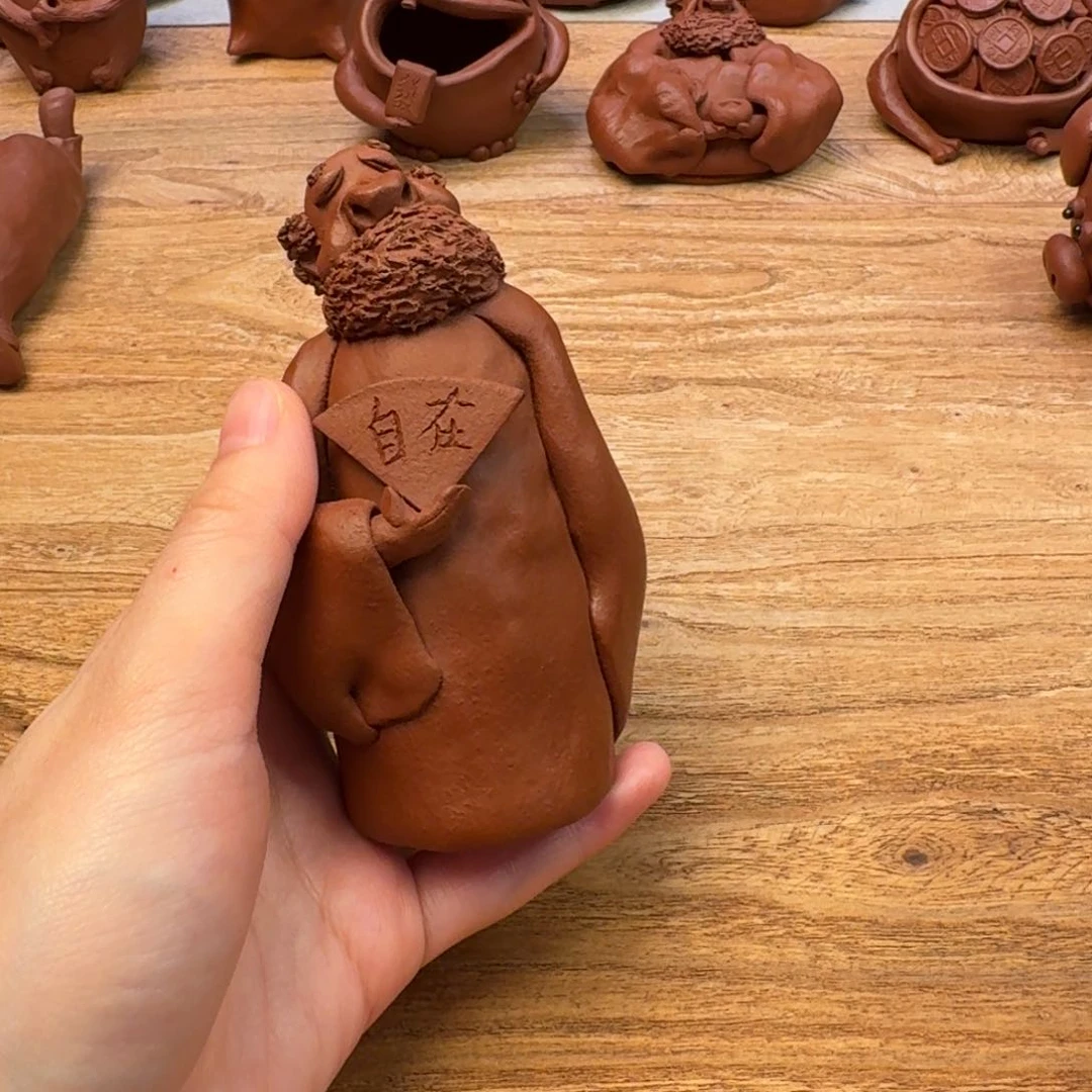 紫砂茶壶所****?达摩达摩