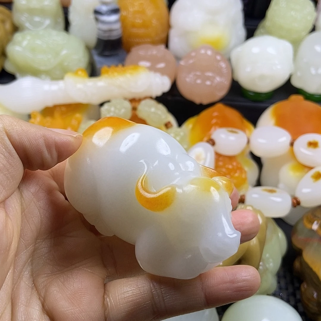 无花朵原石手把件