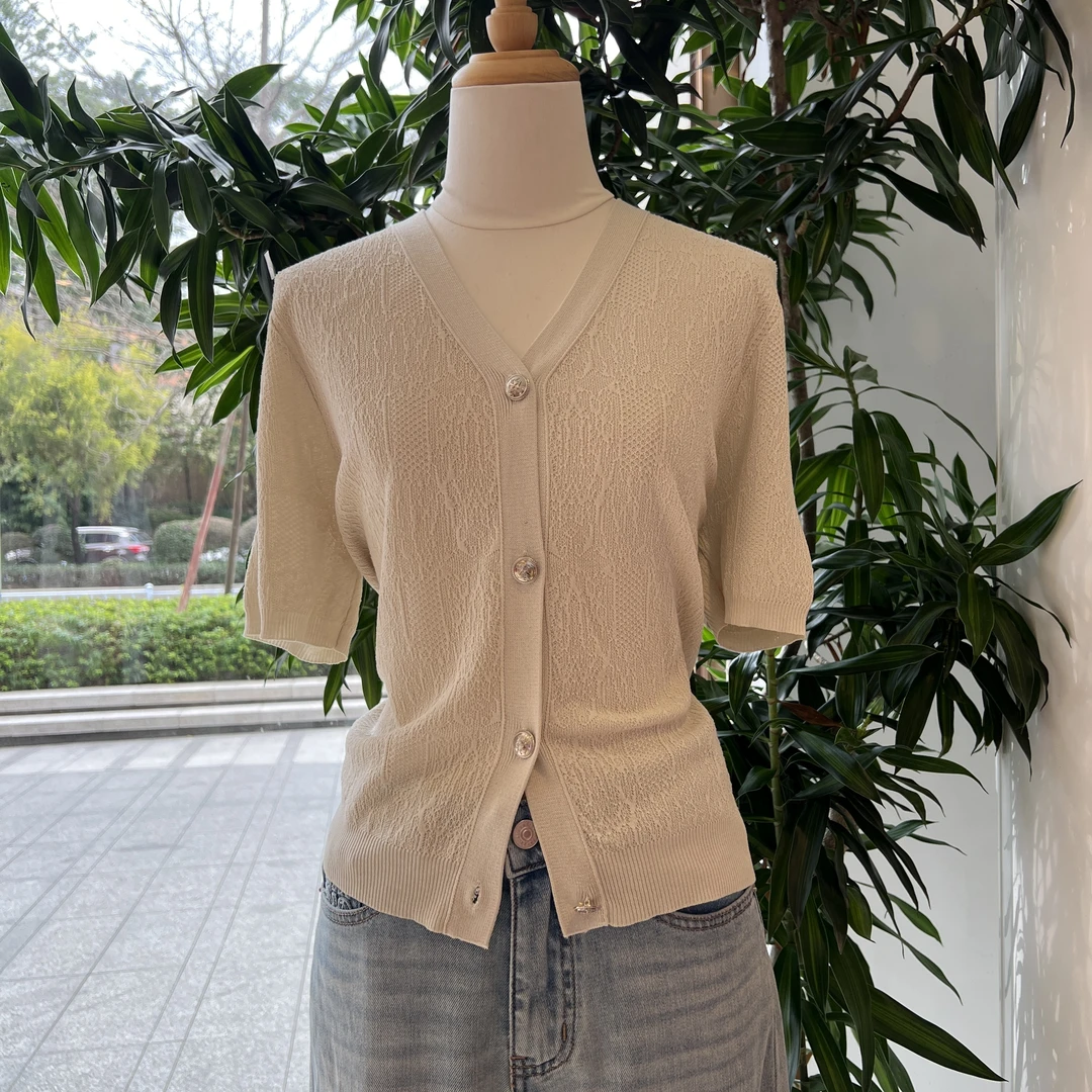 2025夏欧若风常规袖女时尚气质短袖白色镂空短款开衫简约百搭