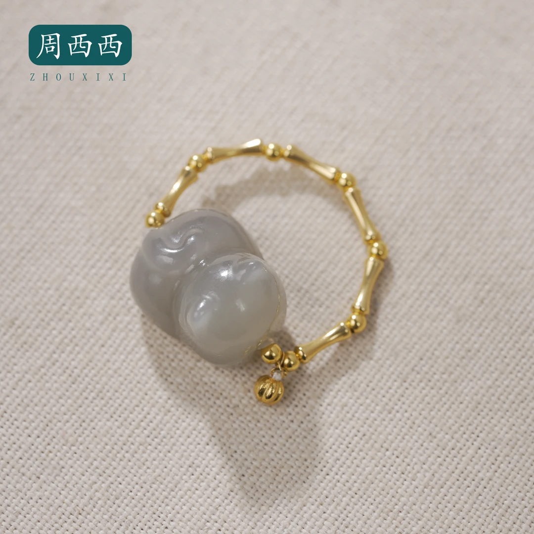 周西西精美18K烟紫趴趴猫戒指1.5*1.3*1.16百搭多样性发货19387