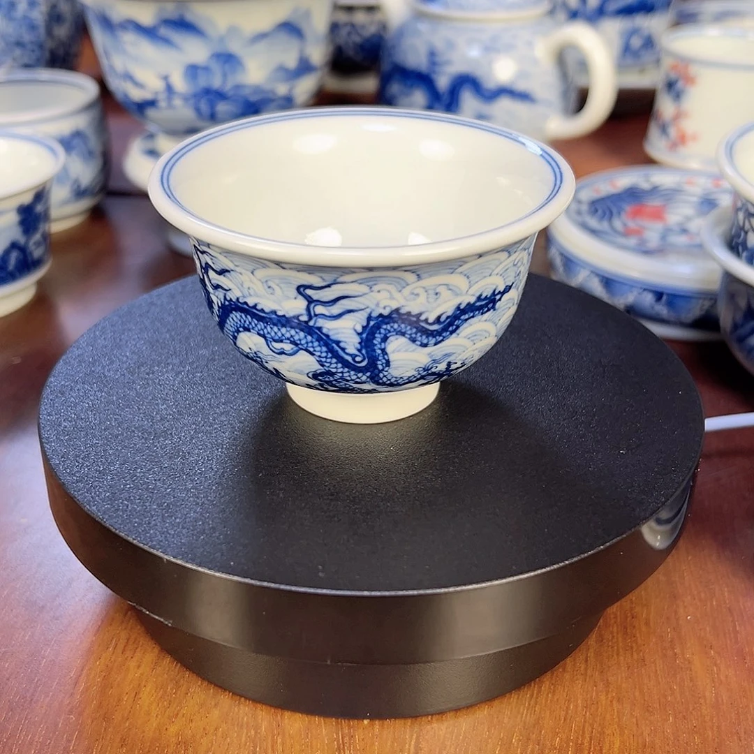 正宗柴窑海水龙纹压手杯