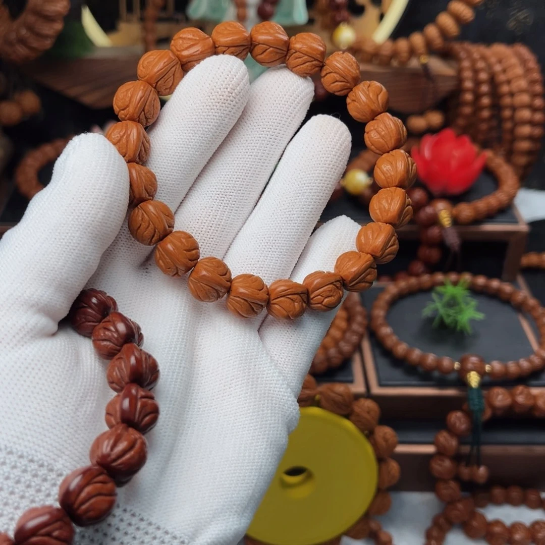 吊坠桃核12玉龙脊手串