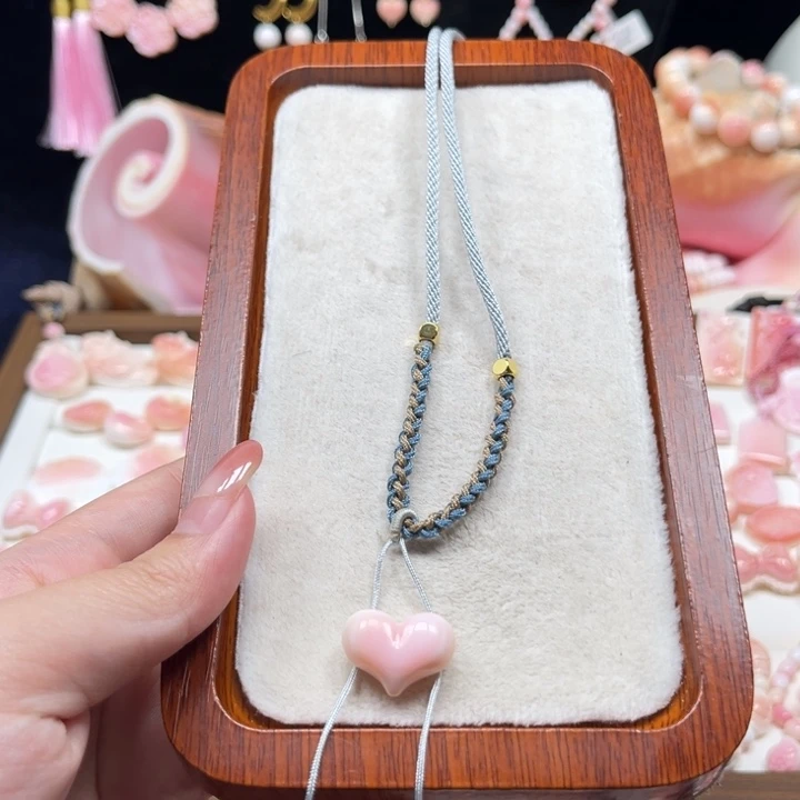 阳***光贝壳手串/手链粉贝爱心DIY材料费