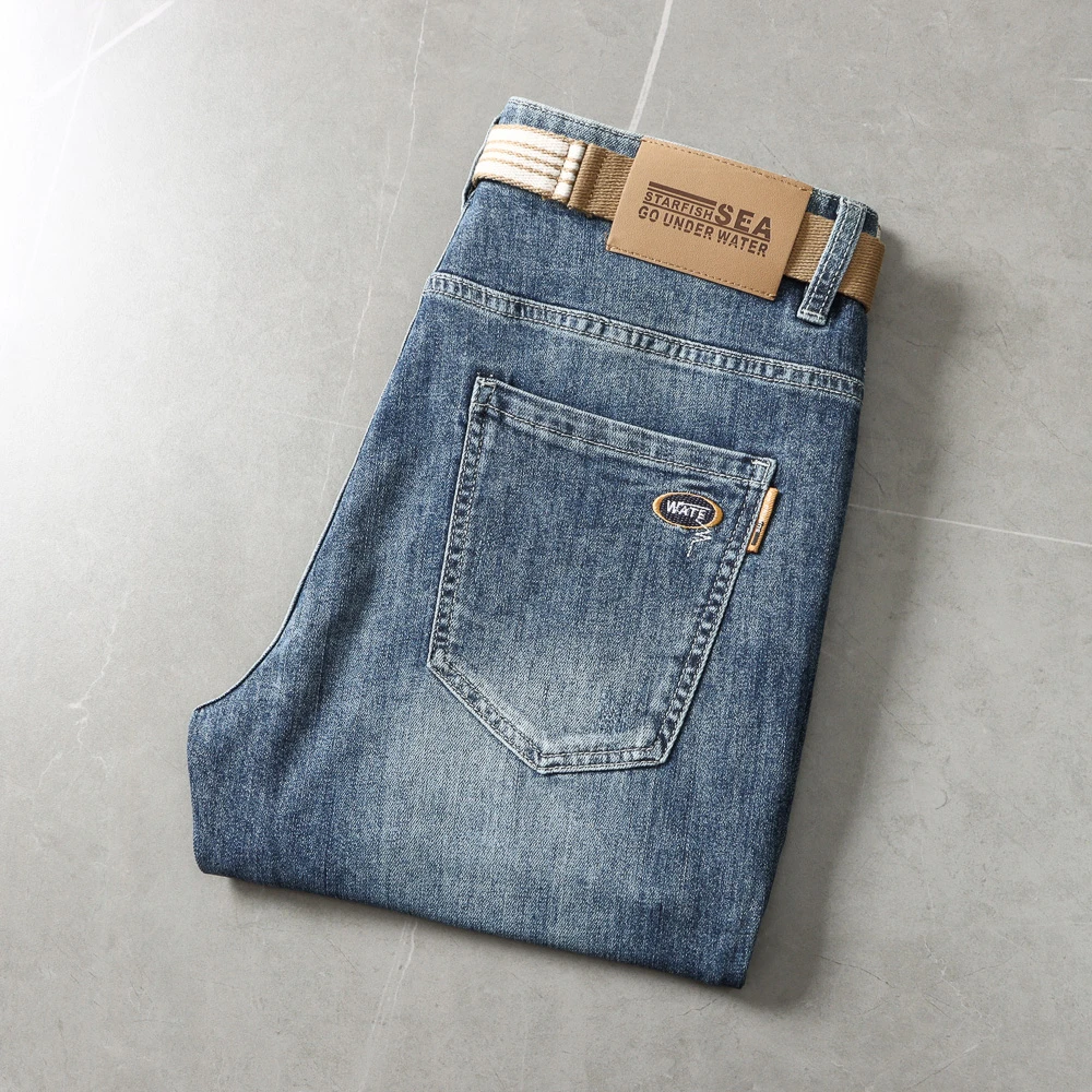 水洗磨白字母刺绣撤柜剪标男春夏通勤直筒裤九分牛仔裤男孩