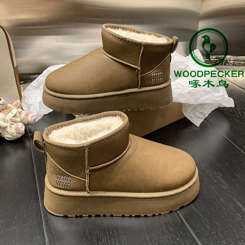 【啄木鸟】女皮毛一体防水防滑雪地靴女冬靴厚底加绒短靴东北大棉鞋