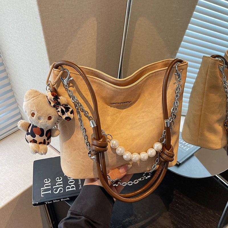 艾米兔女包2025新款小众设计百搭休闲质感洋气通勤单肩斜挎水桶包