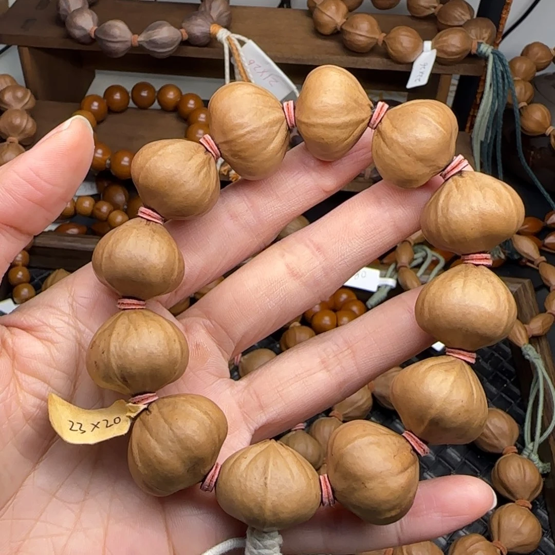 手串橄榄核10。2.3*2.0四花蒜头