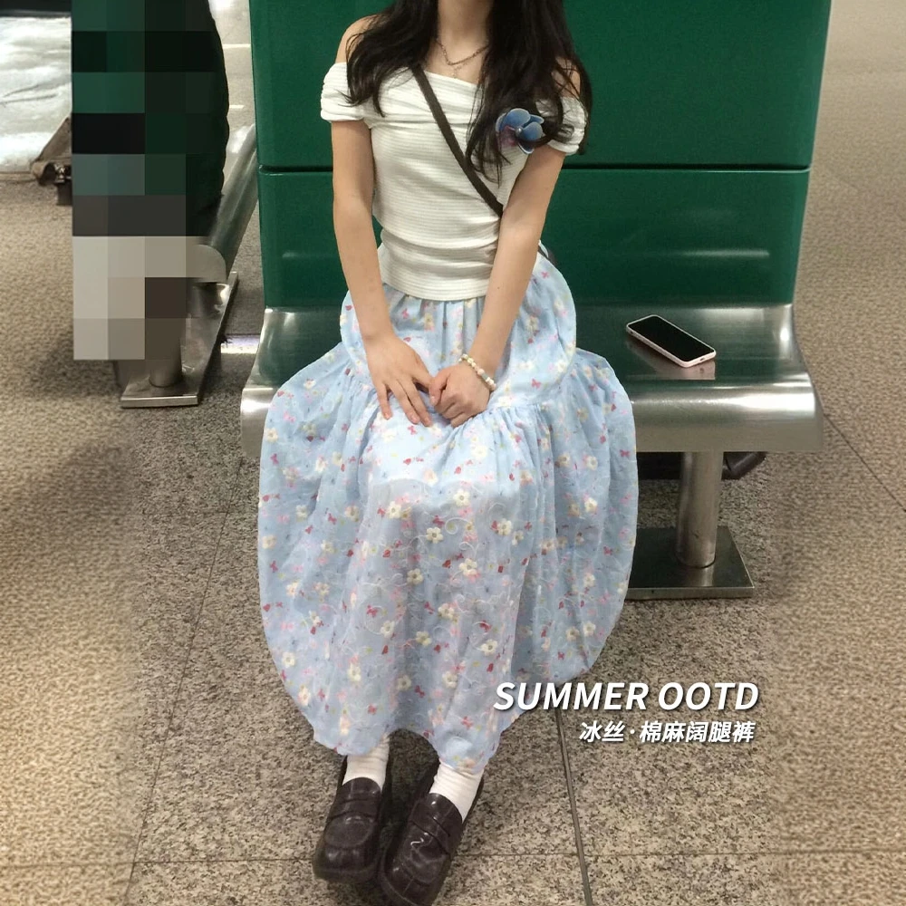 蓝色碎花半身裙女夏季2025新款显瘦刺绣伞裙中长款垂感a字蛋糕裙