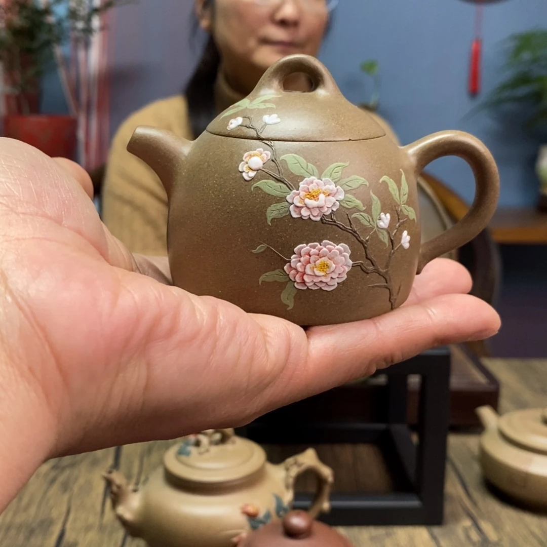 段泥茶壶落**根蟹壳青秦权